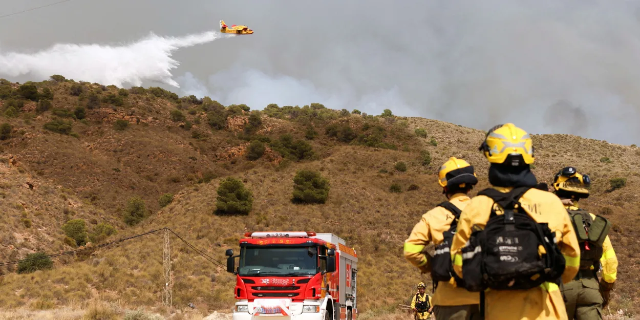 Allez_église_sonnez_cloches_fuite_face_flammes_Espagne